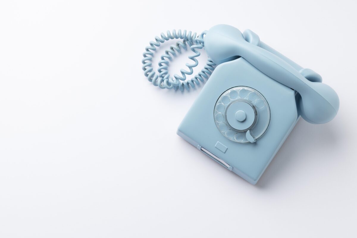 top view blue monday concept composition with telephone
